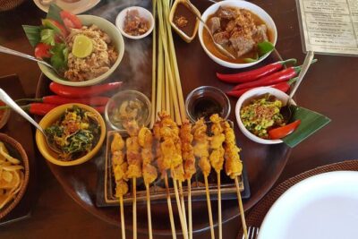 #1 Paon Bali Cooking Class with Shuttle Ubud Only - The Cooking Session: Coconut Curry, Banana-Leaf Fish, and Palm-Sugar Banana