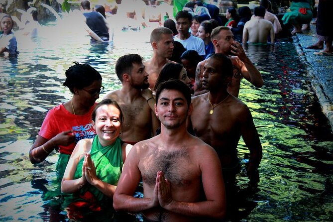 Bali Day Trip: Ubud Temples & Hidden Waterfalls - Stop 1: Tibumana Waterfall and the Bamboo-Bridge Jungle Walk
