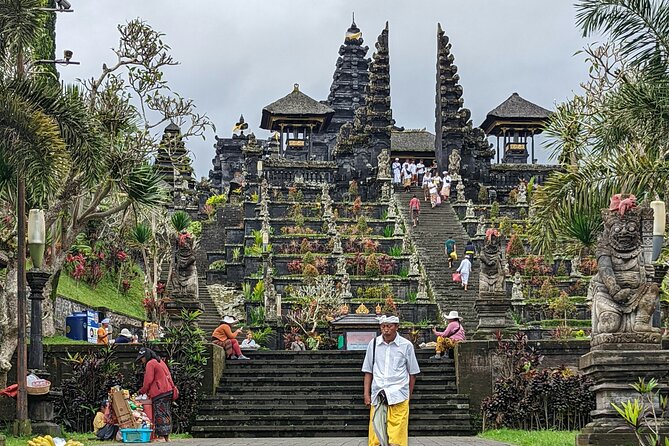 Bali Lempuyang Gate of Heaven and Besakih Mother Temple Tour - Tirta Gangga Water Palace: koi pond calm between temple climbs