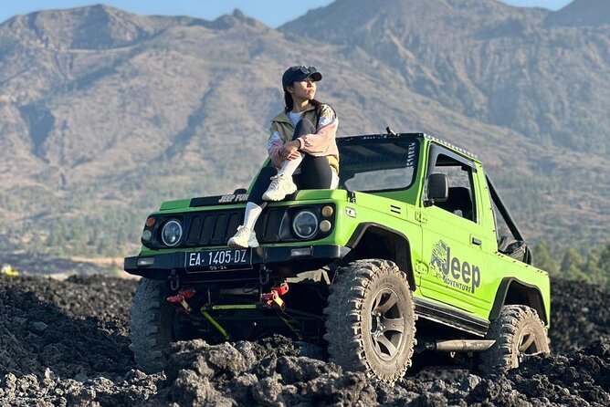 Bali Mount Batur Jeep Sunrise and Black Lava Jeep Tour - Black lava and sand fields: where the guide makes the trip