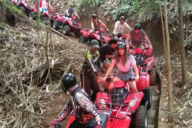 Bali Quad bike ATV passing through Waterfall, Cave & Rice fields - The Trail: Waterfall, Cave, River, Jungle, and Rice Fields