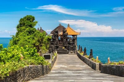 Bali Tana Lot Half day Sunset - Pura Batu Bolong: the arched rock bridge and sunset clifftop views
