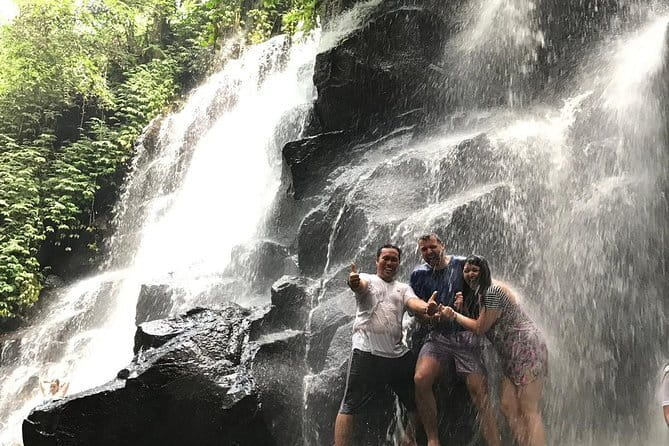 Bali Waterfall in One Day Tours, Hidden Waterfall - All Inclusive - Kanto Lampo Waterfall: black rock cliff views and your best photo timing