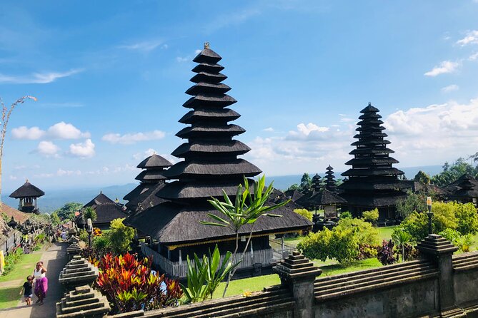 Bali Waterfalls and Temples Tour - Goa Raja Waterfall: steps, rainforest cool air, and that infinity-pool vibe