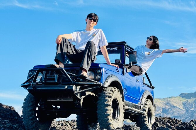 Batur 4WD Jeep Sunrise and Kintamani Cafe Hopping - Stop 2: Black lava and sand formations after the sun