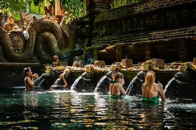 Best of Ubud: Waterfalls, Temple & Rice Terraces Private Day Tour - Kanto Lampo Waterfall: rocks, water, and great phone angles