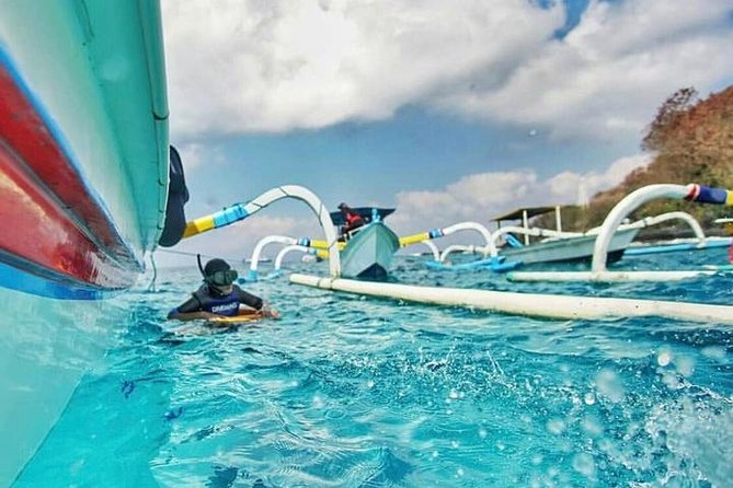 Blue Lagoon Snorkeling and Lunch with Visit Tegenungn Waterfall in Ubud - Stop by Stop: Blue Lagoon Beach and Tanjung Jepun Time