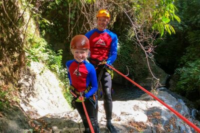 Canyoning Adventure in Sambangan Canyon - The Main Event: slides, jumps, abseils, swimming, and zip-line