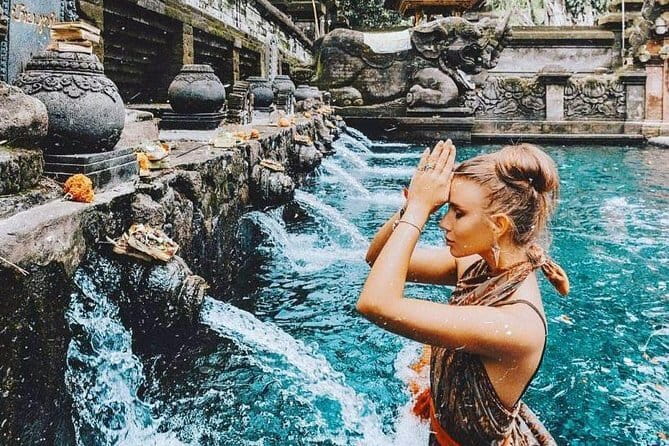 Eastern Bali and Besakih Temple Tour - Tukad Cepung waterfall: the cave setting changes everything