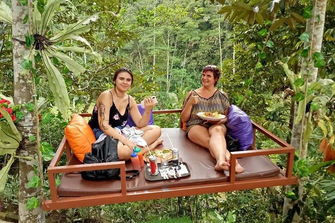 Get wet on Bali's most stunning waterfalls - Tibumana Waterfall: A Rain-Forest Swim Stop You Can Actually Enjoy