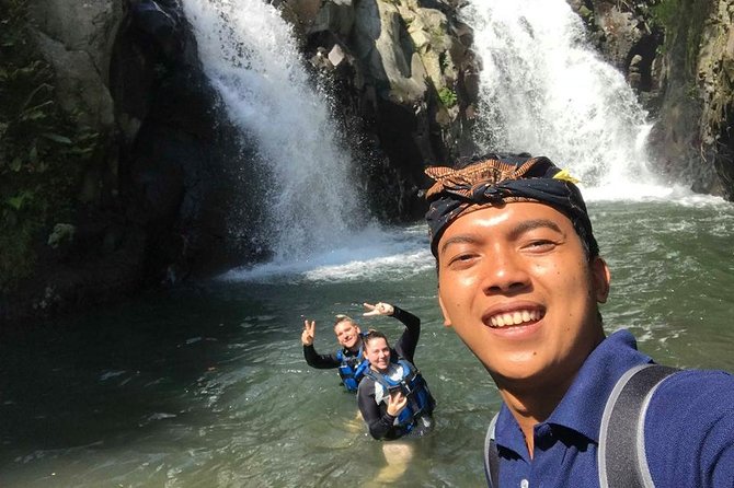 Jumping Sliding at Aling- aling Waterfall - Wanagiri Hidden Hill - Handara Gate - What the included driver and guide really do for you