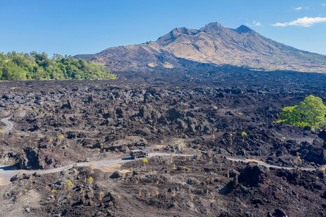 Kintamani Black Lava Sunrise Jeep Adventure with Temple in Bali - Riding Through Black Lava at Kawasan Gunung Batur Kintamani