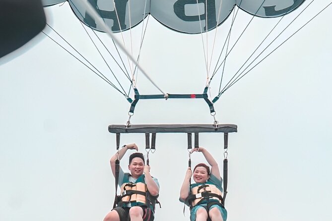 Private Bali Romantic Couple Tour with Parasailing Adventure - Hand-in-hand parasailing over the Indian Ocean (about 8 minutes)