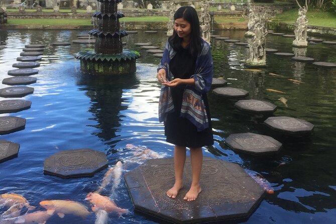 Royal Karangasem Heritage Tour - Ujung Water Palace (Sukasada Park): Fishpond calm and European lines