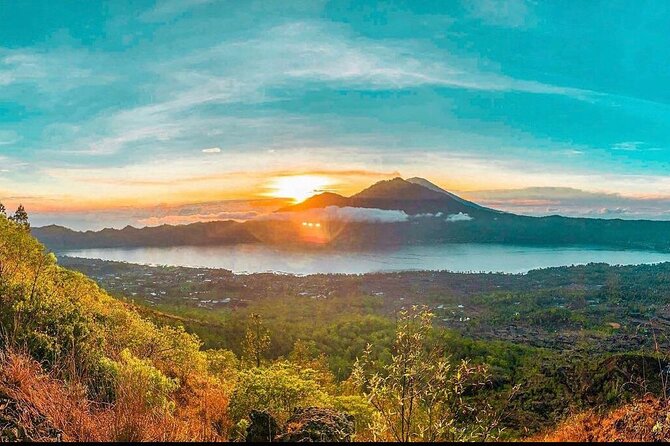Sharing Mount Batur Sunrise Trekking Guide Pick Up and Drop Off - Sunrise at 6:15–6:45: crater views plus the timing that matters