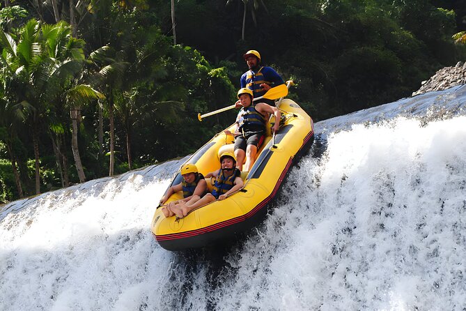 Telaga Waja White Water Rafting and Uluwatu Sunset Tour - Telaga Waja rafting: safety gear, rain-forest scenery, and dam runs
