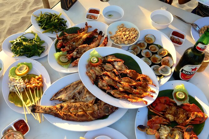 Telaga Waja White Water Rafting and Uluwatu Sunset Tour - Jimbaran Bay dinner: seafood feast on the sands