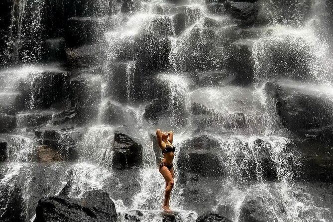 Tirta Empul temple, Jungle Swing and Waterfalls - Private Tour - Kanto Lampo Waterfall: dramatic rock drop views without a brutal hike