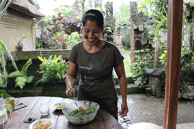 Traditional Balinese Meal in Ubud in Dewa's Family Village Home - The dining setup: you eat your meal, they focus on spirituality